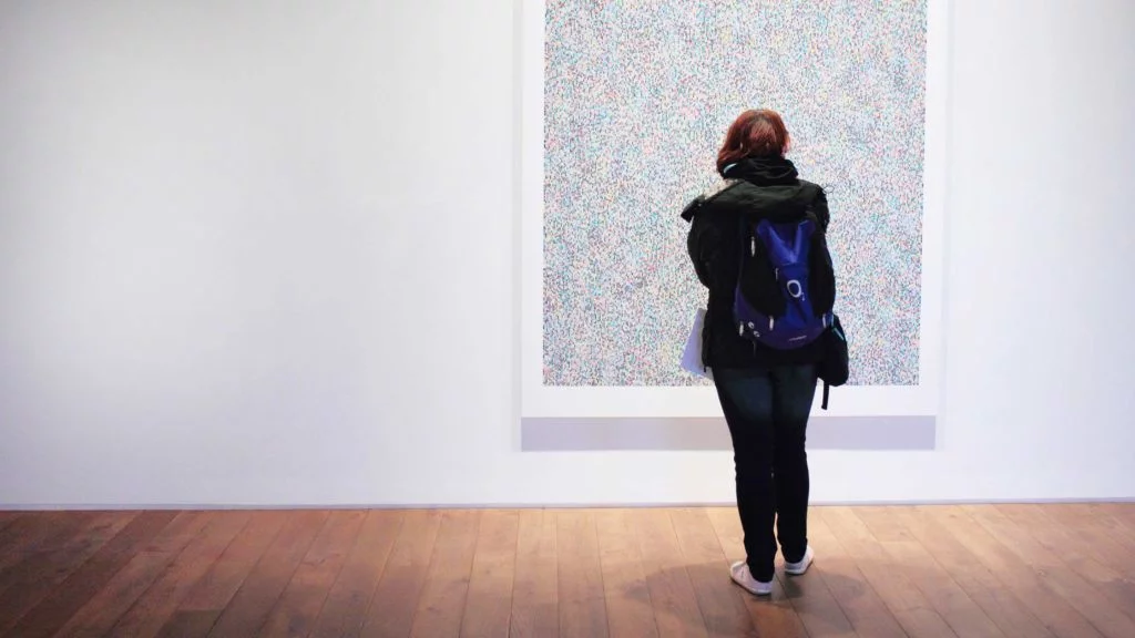 Decision Science | Arts & Culture Fundraising | Woman in art gallery - slide