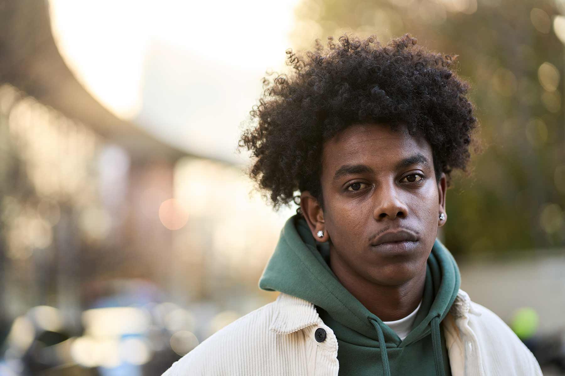 Decision Science | How Amnesty Brazil Bridged the Gap Between Mission and Message Using AI | Image of young man in hoodie