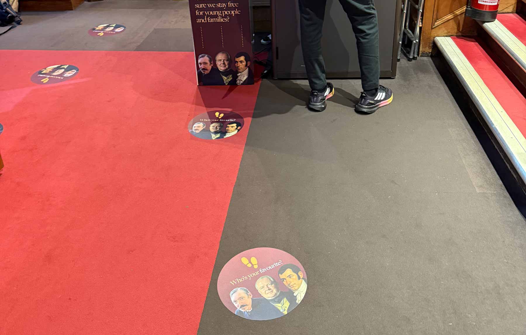 Instances of the floor decals we designed to guide visitors to the donation box.