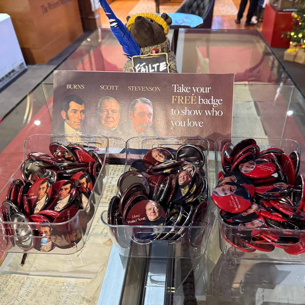 Containers to hold the three variations on the pin badges we designed for the Writers' Museum